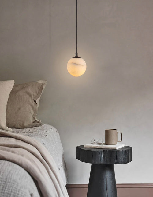 Load image into Gallery viewer, Moonlit Natural Alabaster Globe Pendant
