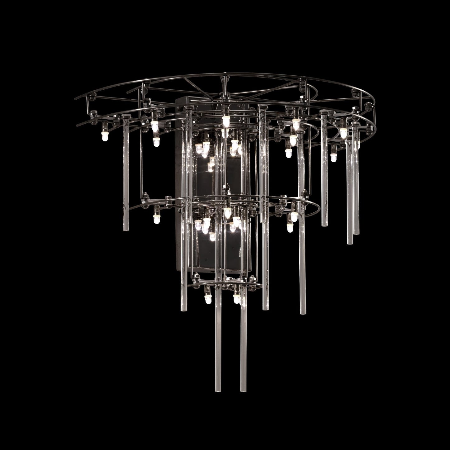 Chandelier with multiple tiers of lights on a black background