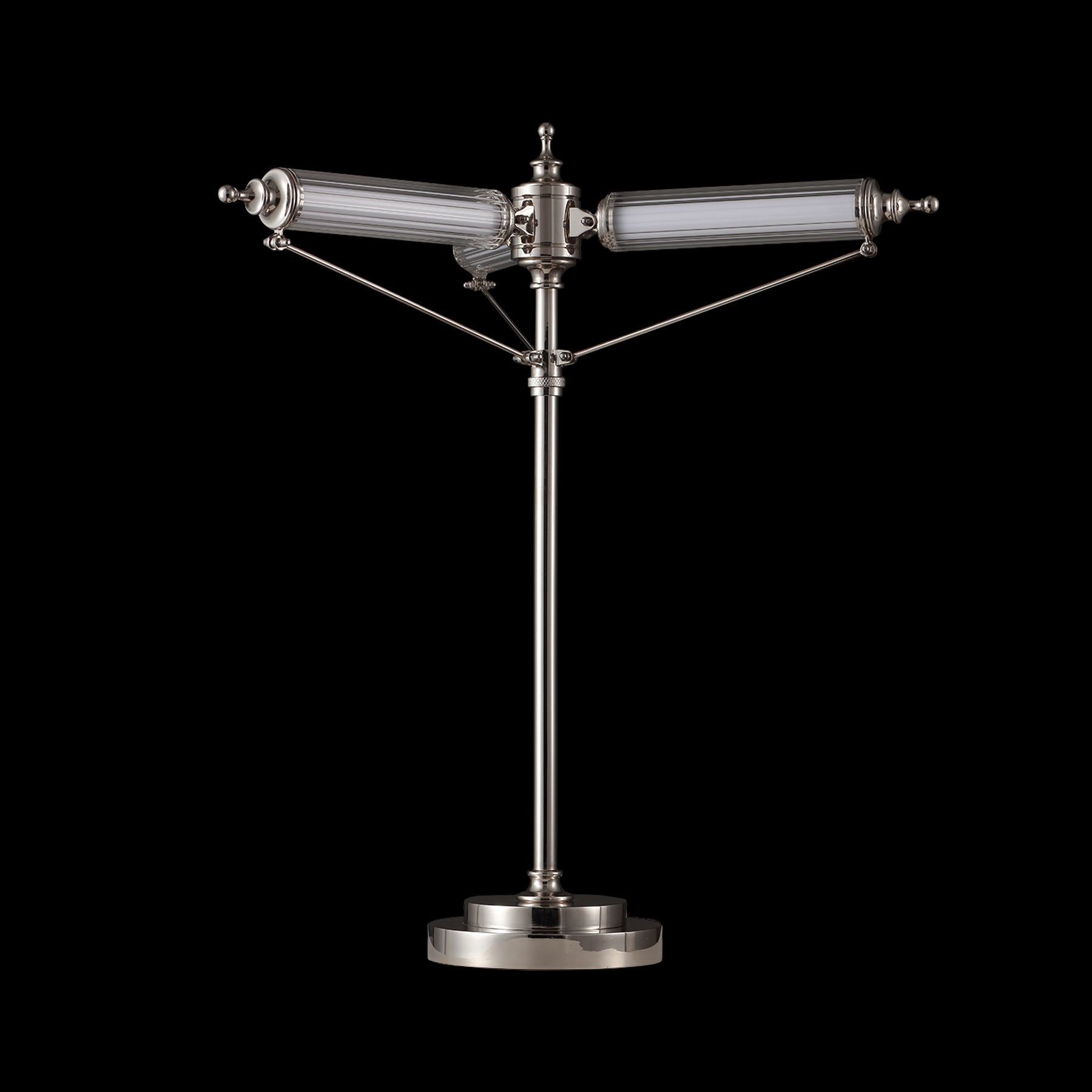 Decorative lamp with three cylindrical glass shades on a black background