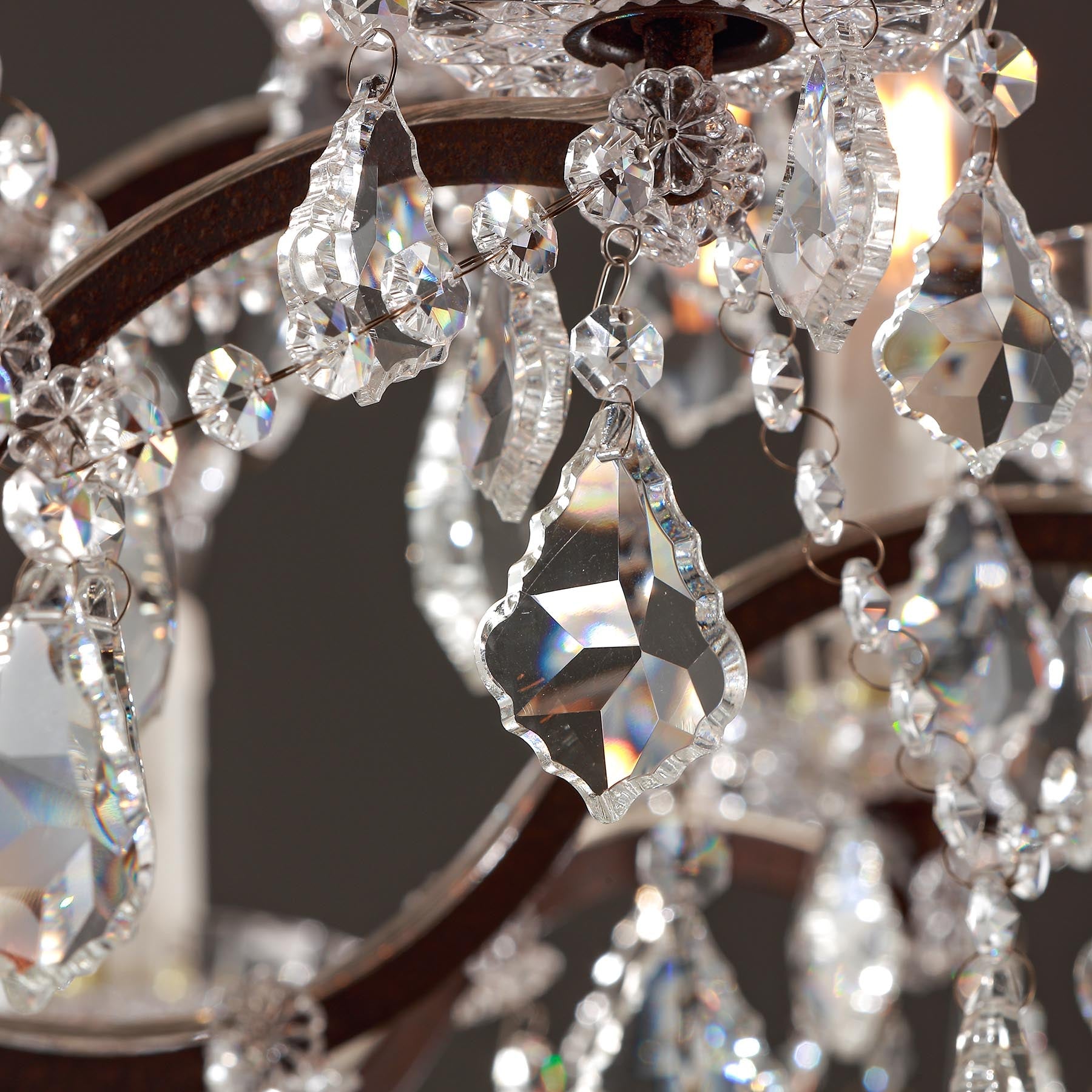 Close-up of a crystal chandelier with a blurred background