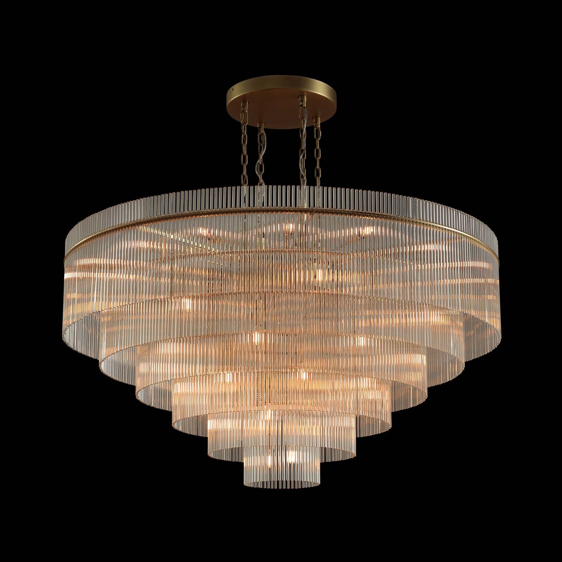 Chandelier with multiple layers of glass shades on a black background