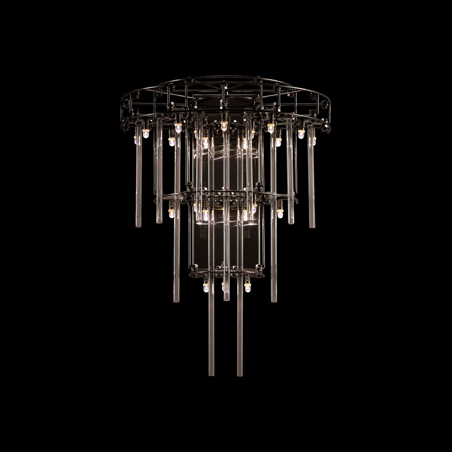 Chandelier with multiple tiers of lights on a black background